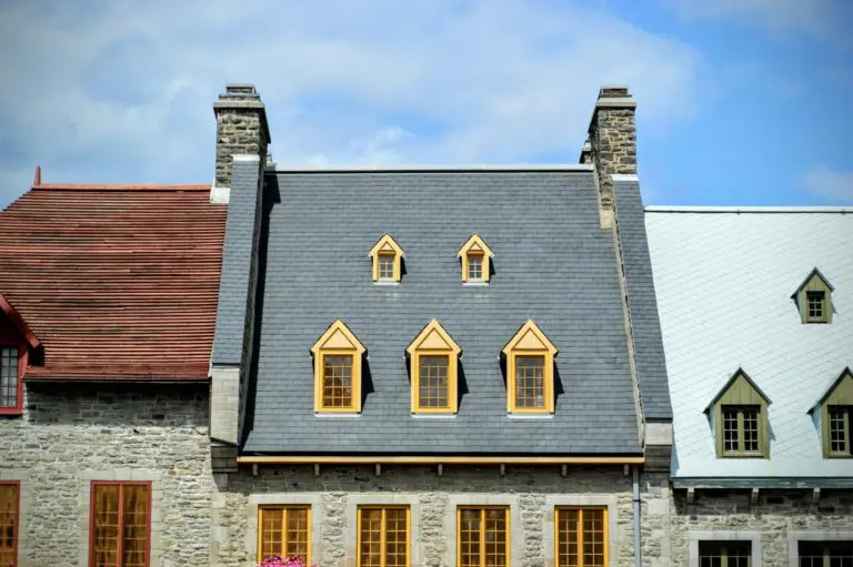 Roofing Material Showdown: Comparing Asphalt Shingles, Metal, and Wood for Your Home